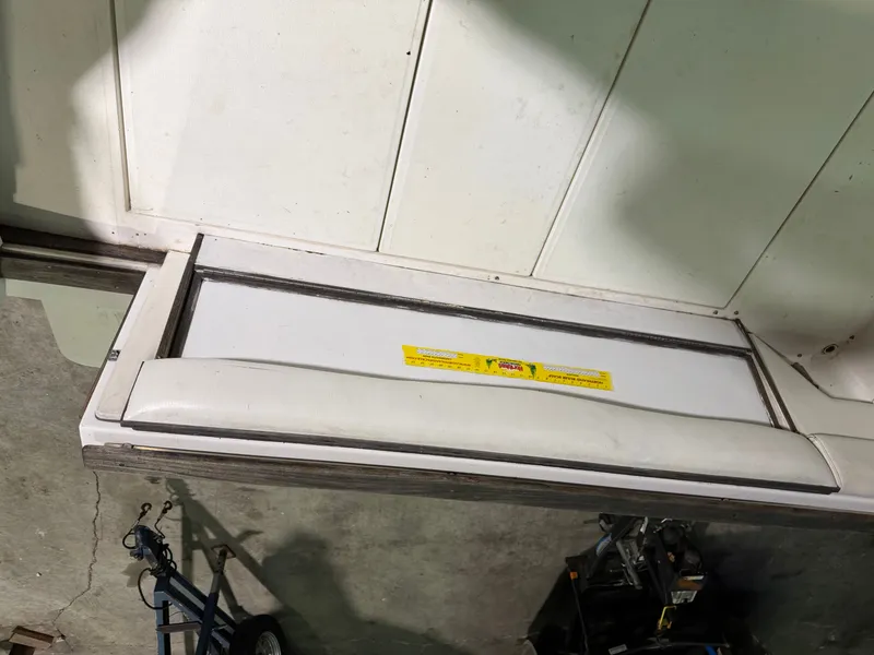 Slide: The Image of Rear seat of a 1989 Sea Ray 300 Sundancer boat. - 26