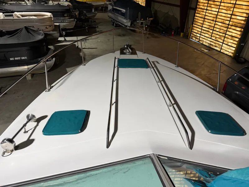 Slide: The Image of 1989 Sea Ray 300 Sundancer boat deck in storage facility. - 6