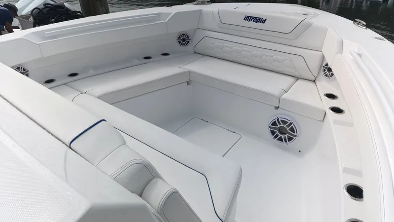Slide: The Image of The image shows the cockpit of a 2027 Intrepid 35 PANACEA with white upholstery. - 42