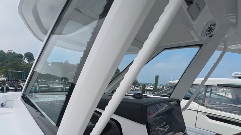 Slide: The Image of The image shows the cockpit of a 2027 Intrepid 35 PANACEA boat with modern details. - 38