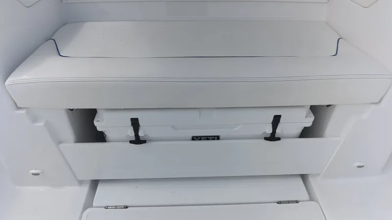 Slide: The Image of The Intrepid 35 PANACEA 2027 features a built-in bench seat with a Yeti cooler underneath. - 17