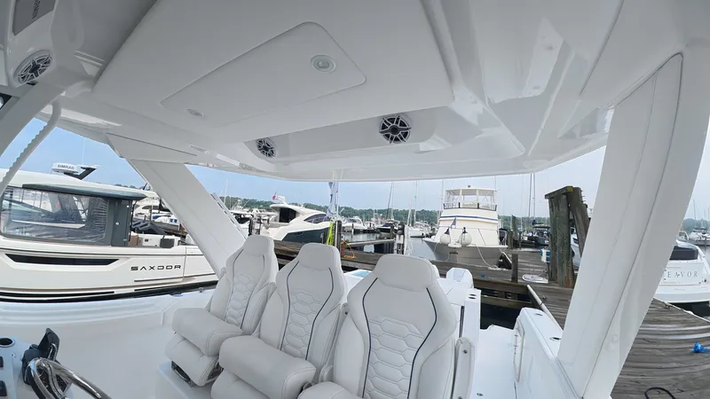 Slide: The Image of The image shows the cockpit of an Intrepid 35 PANACEA with luxurious seating and modern design. - 26