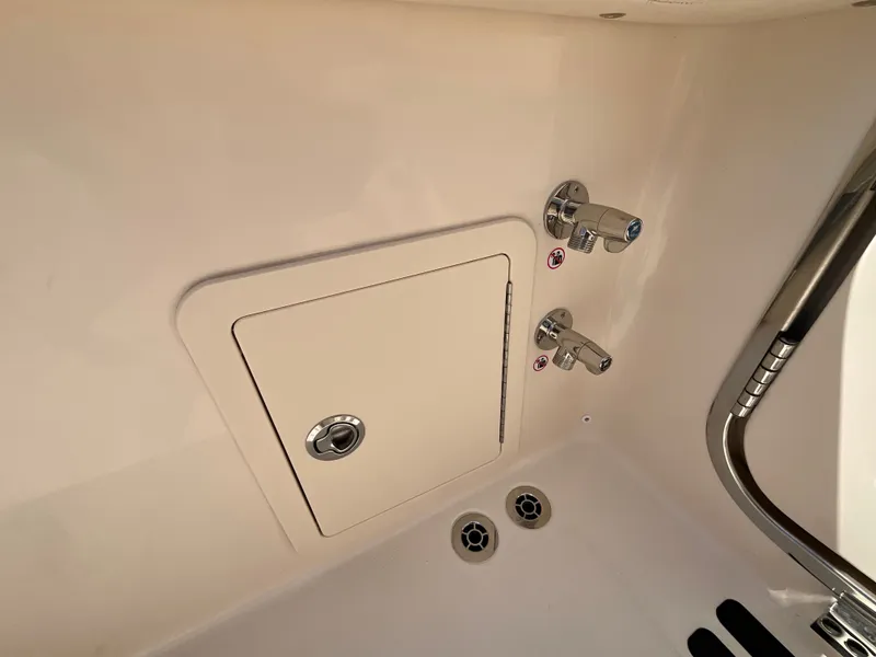 Slide: The Image of Interior view of a boat with an access hatch and fixtures. - 4