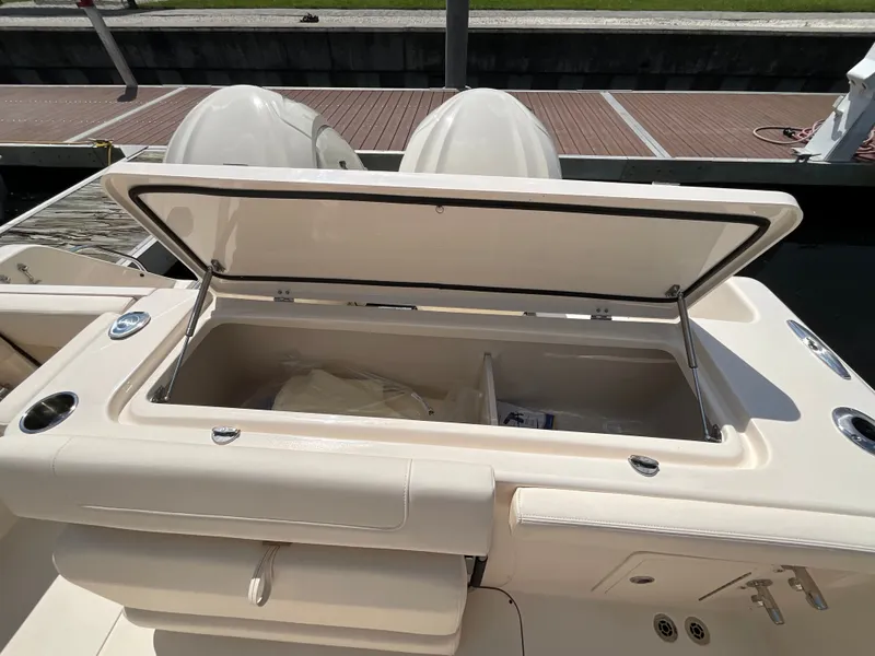Slide: The Image of The image shows the storage compartment of a 2027 Grady-White Canyon 306 boat. - 5