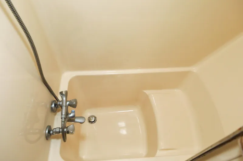 Slide: The Image of Bathtub with faucet in 1997 Hunter Passage 42 yacht bathroom. - 26