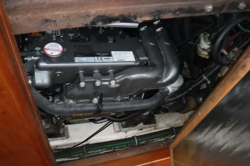 Slide: The Image of Engine compartment of a 1997 Hunter Passage 42 sailboat. - 35