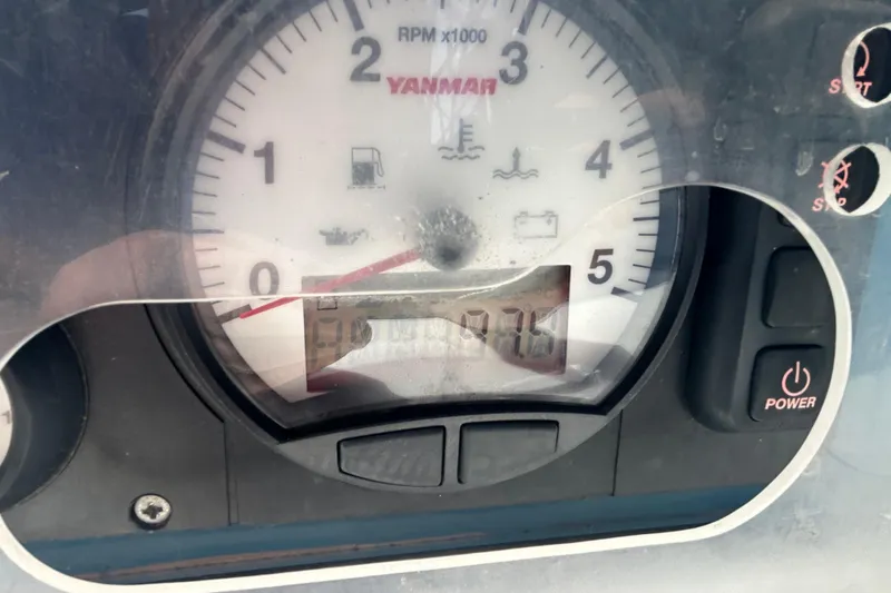 Slide: The Image of Close-up of a Yanmar RPM gauge on a 1997 Hunter Passage 42 sailboat. - 39