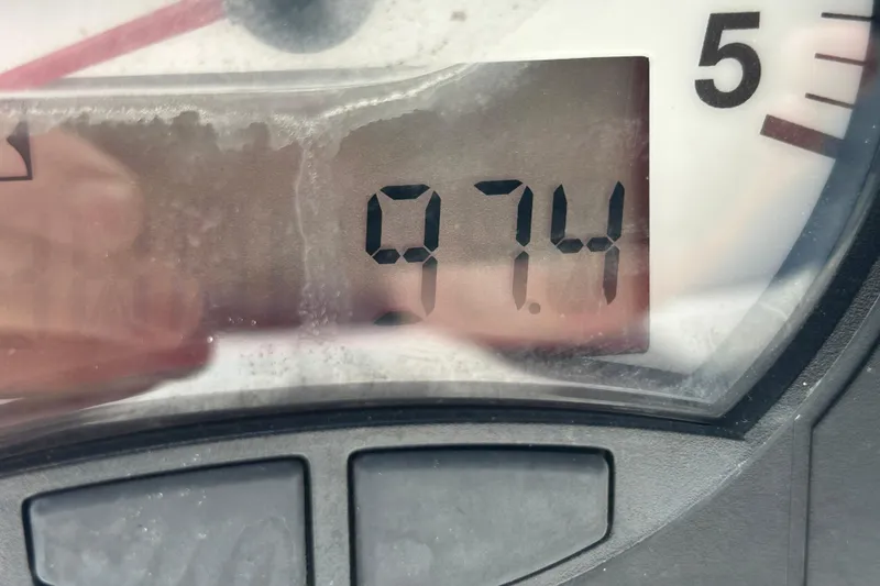 Slide: The Image of Close-up of a Hunter Passage 42 gauge displaying 974 hours. - 40