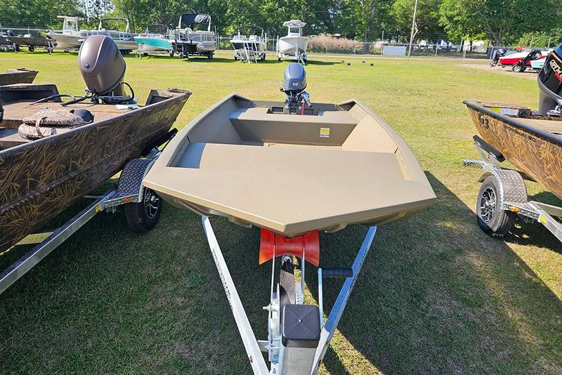 Slide: The Image of 2026 G3 Gator Tough 1548 VBW boat on trailer, displayed outdoors. - 6