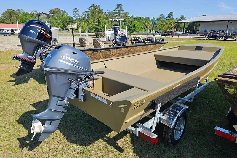 Slide: The Image of 2026 G3 Gator Tough 1548 VBW boat with Yamaha outboard motor on trailer. - 8