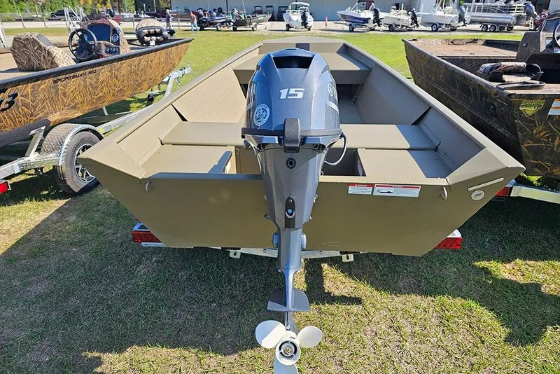 Slide: The Image of 2026 G3 Gator Tough 1548 VBW boat with 15 HP motor on display outdoors. - 9