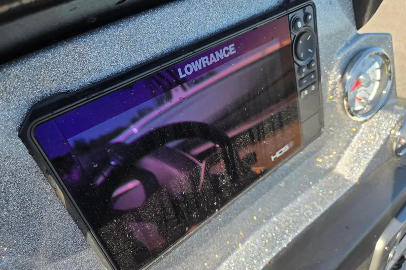 Slide: The Image of Dashboard of a 2023 Nitro Z19 boat featuring a Lowrance HD display. - 10
