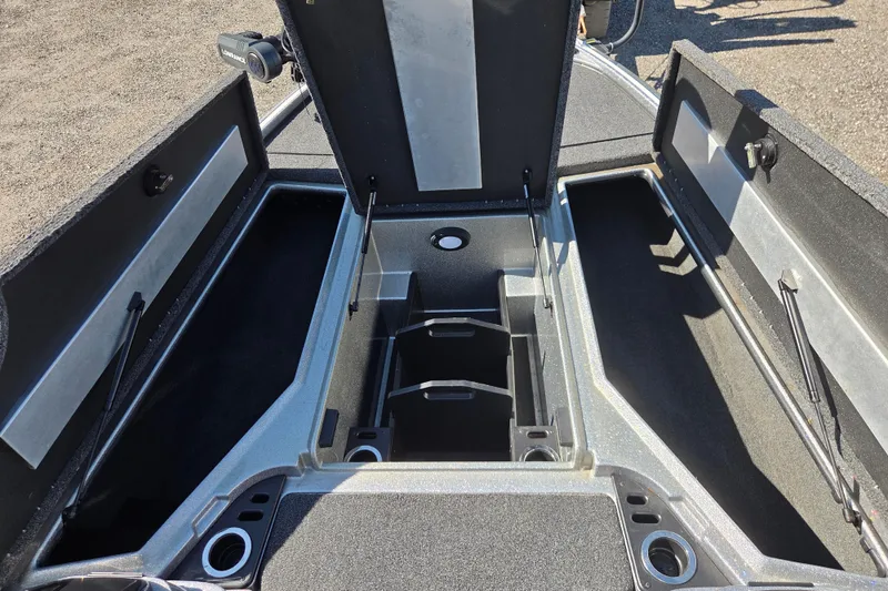 Slide: The Image of 2023 Nitro Z19 boat storage compartments open, showcasing spacious interior design. - 15
