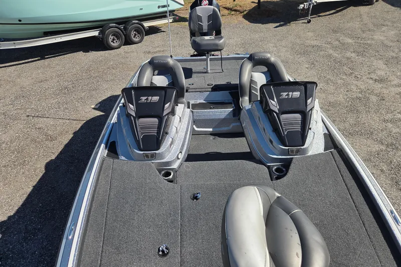 Slide: The Image of 2023 Nitro Z19 boat interior with seating and storage compartments. - 16