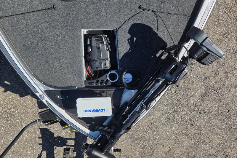 Slide: The Image of 2023 Nitro Z19 boat deck with Lowrance electronics and storage compartment. - 17