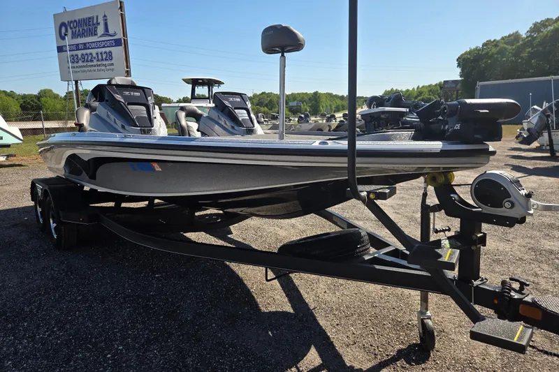 Slide: The Image of 2023 Nitro Z19 boat on trailer at O'Connell Marine dealership. - 2