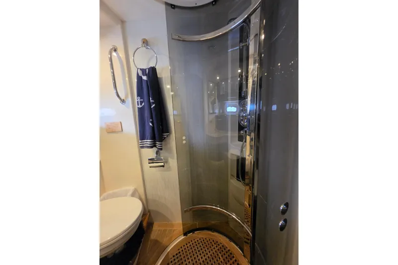 Slide: The Image of Bathroom interior of 2000 Sealine T51 MY yacht, featuring modern shower and nautical decor. - 30