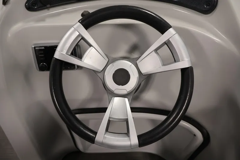 Slide: The Image of Steering wheel of a 2019 Bentley Pontoons 200 CRUISE boat, featuring sleek design. - 17