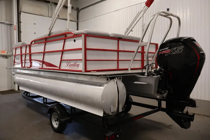 Slide: The Image of 2019 Bentley Pontoons 200 CRUISE boat with Mercury Pro XS engine in a garage. - 7