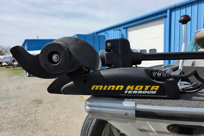 Slide: The Image of Minn Kota Terrova trolling motor on 2016 Alumacraft Trophy 175 boat, blue building background. - 4