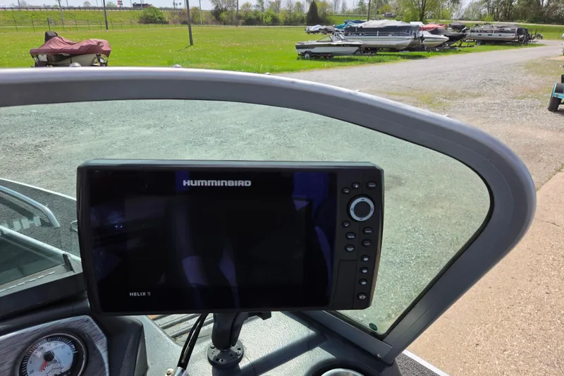 Slide: The Image of 2016 Alumacraft Trophy 175 boat with Humminbird Helix 9 fish finder display. - 5