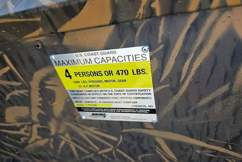 Slide: The Image of U.S. Coast Guard capacity label on 2026 G3 Gator Tough 17 SC boat, 4 persons or 470 lbs. - 10