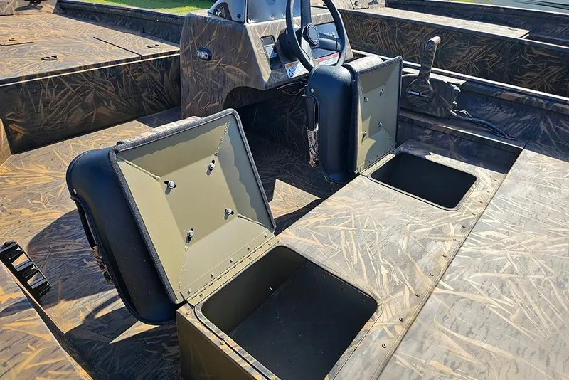 Slide: The Image of 2026 G3 Gator Tough 17 SC boat interior with open storage compartments. - 12