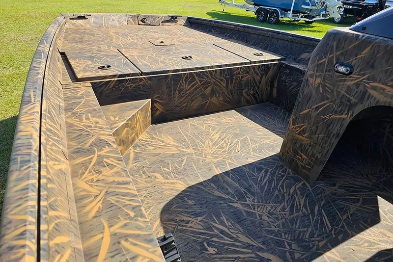 Slide: The Image of 2026 G3 Gator Tough 17 SC boat with camouflage interior design. - 13