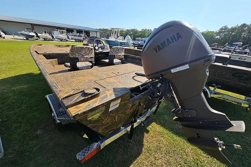 Slide: The Image of 2026 G3 Gator Tough 17 SC boat with Yamaha motor on display outdoors. - 3