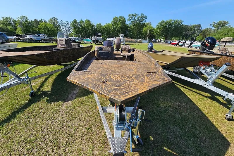 Slide: The Image of 2026 G3 Gator Tough 17 SC boat on trailer, displayed outdoors. - 4