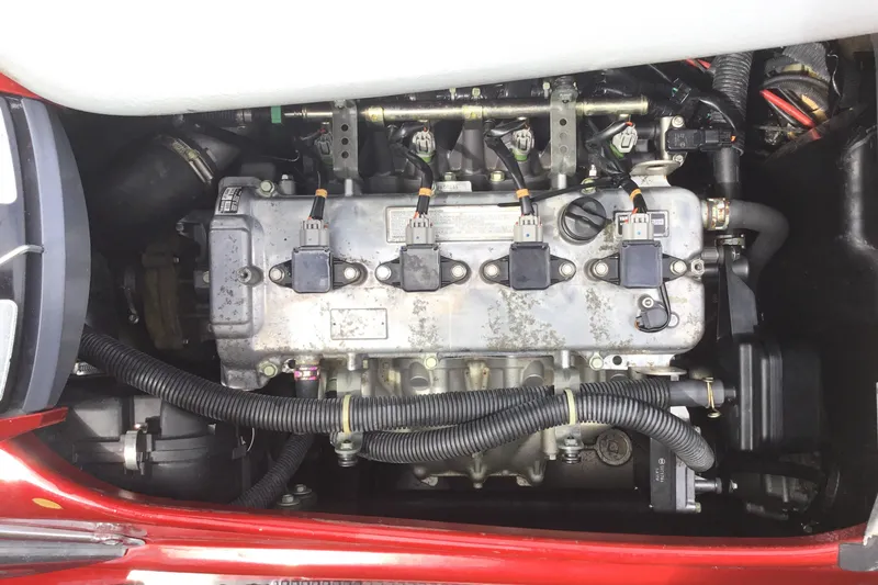 Slide: The Image of 2010 Yamaha FX SHO engine compartment, showcasing detailed mechanical components. - 10