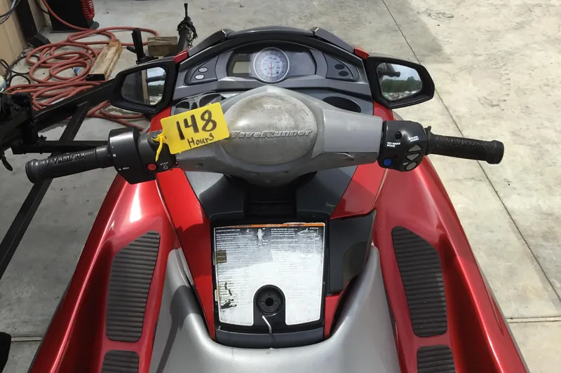 Slide: The Image of 2010 Yamaha FX SHO jet ski dashboard with 148 hours usage indicator. - 8