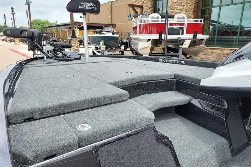 Slide: The Image of 2021 Skeeter ZX200 boat with spacious deck and modern design. - 5