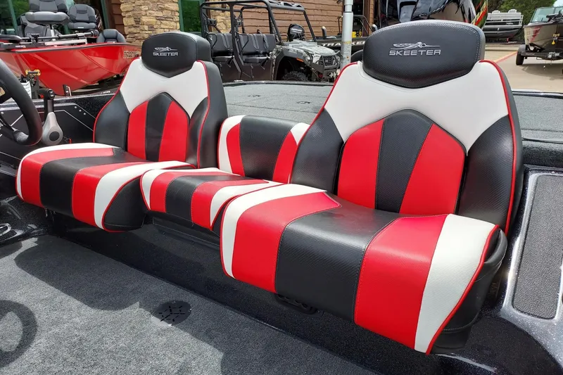 Slide: The Image of 2021 Skeeter ZX200 boat seats in red, black, and white design. - 8