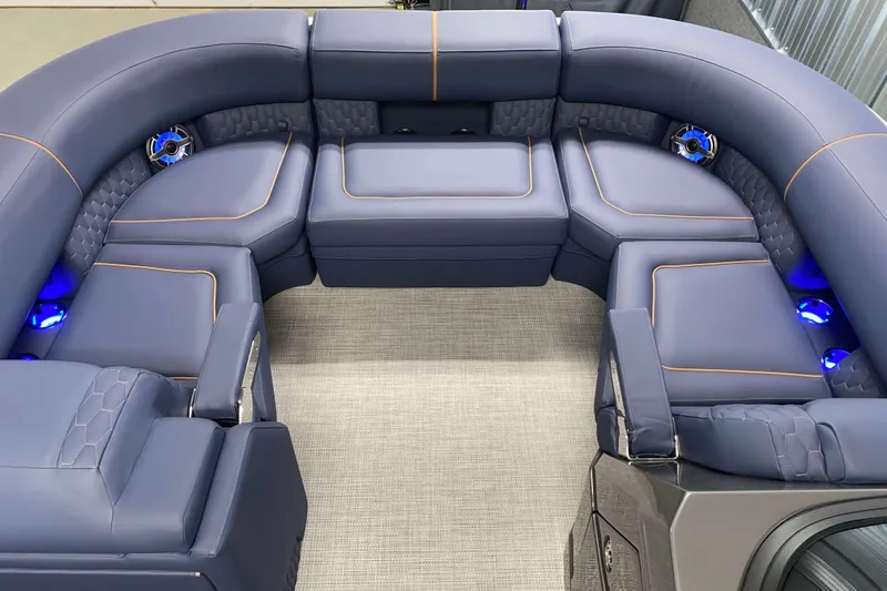 Slide: The Image of Luxurious seating on 2025 Sylvan M3 DLZ DH Tritoon with blue LED lighting. - 27