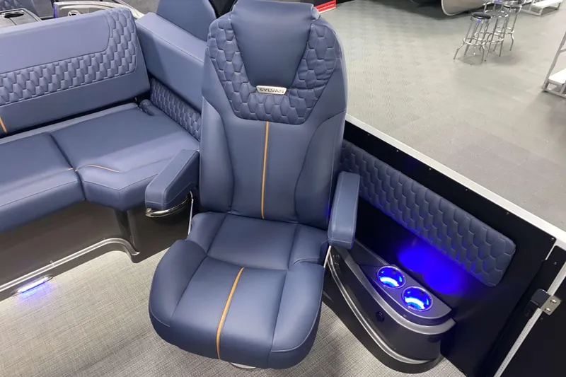Slide: The Image of Luxurious seating on 2025 Sylvan M3 DLZ DH Tritoon with blue LED cup holders. - 28
