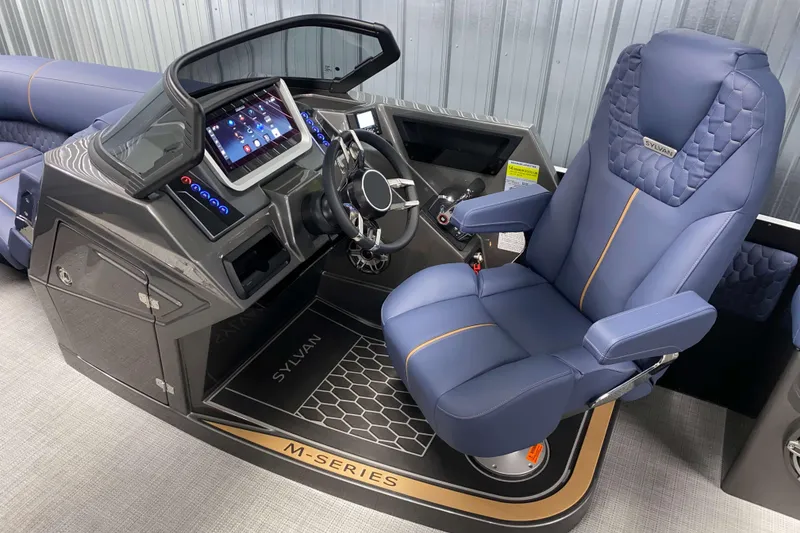 Slide: The Image of Luxurious cockpit of 2025 Sylvan M3 DLZ DH Tritoon with advanced controls and plush seating. - 6