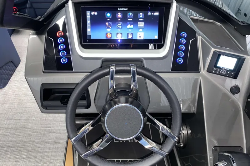 Slide: The Image of Dashboard of 2025 Sylvan M3 DLZ DH Tritoon with touchscreen and steering wheel. - 9