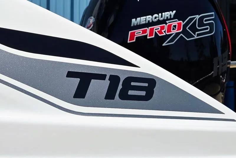 Slide: The Image of 2026 Tahoe T18 boat with Mercury Pro XS engine branding. - 10