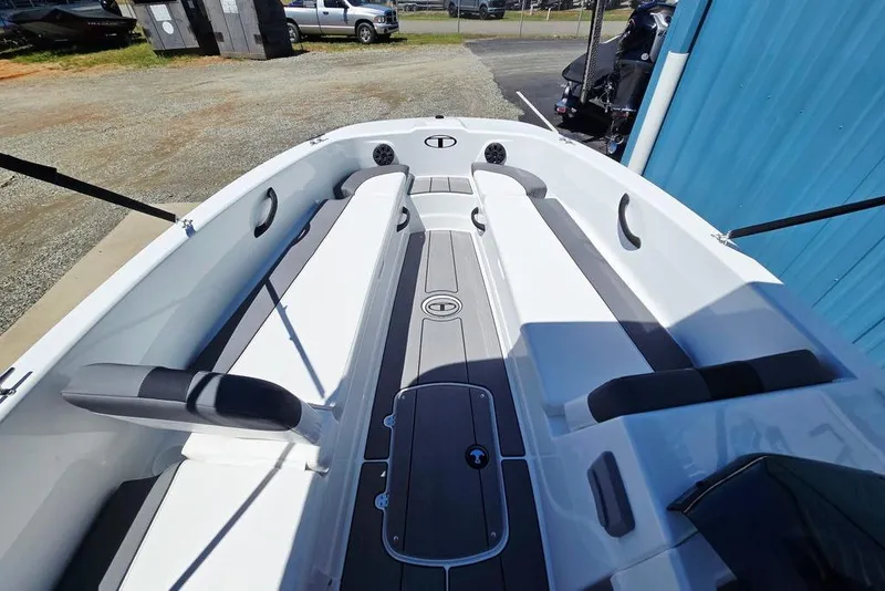 Slide: The Image of 2026 Tahoe T18 boat interior with sleek seating and modern design. - 13