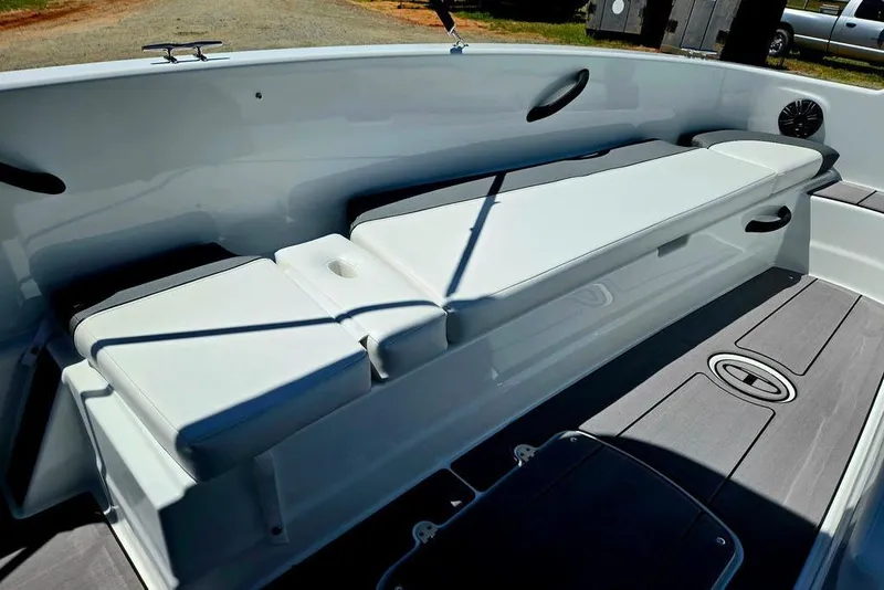 Slide: The Image of 2026 Tahoe T18 boat interior with cushioned seating and sleek design. - 17