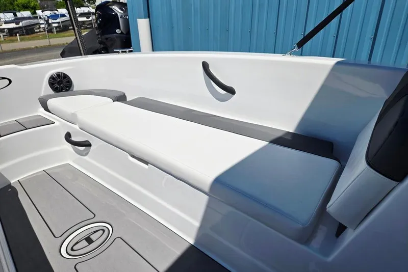 Slide: The Image of 2026 Tahoe T18 boat interior with white seating and modern design elements. - 19