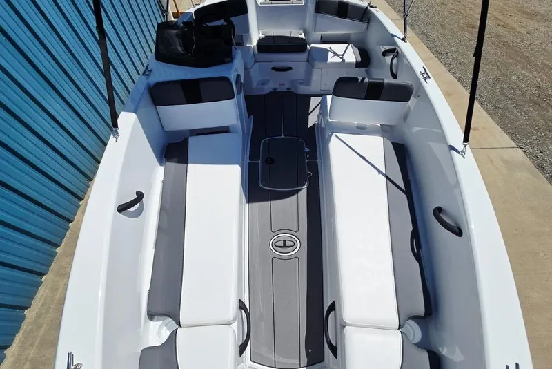 Slide: The Image of 2026 Tahoe T18 boat interior with sleek seating and modern design. - 20