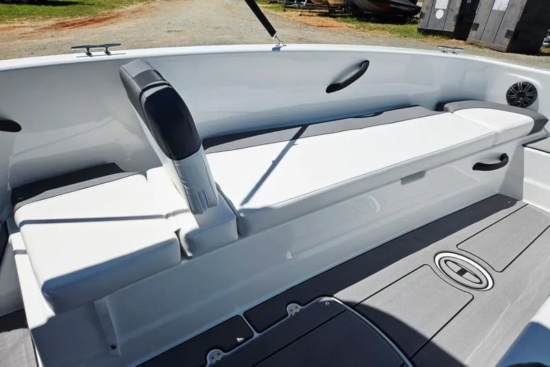 Slide: The Image of 2026 Tahoe T18 boat interior with white seating and sleek design. - 21