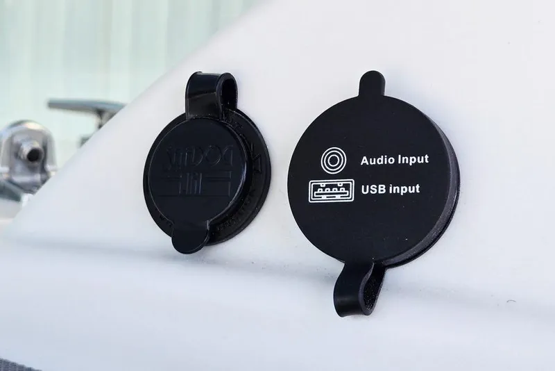 Slide: The Image of Audio and USB input ports on 2026 Tahoe T18 boat. - 26
