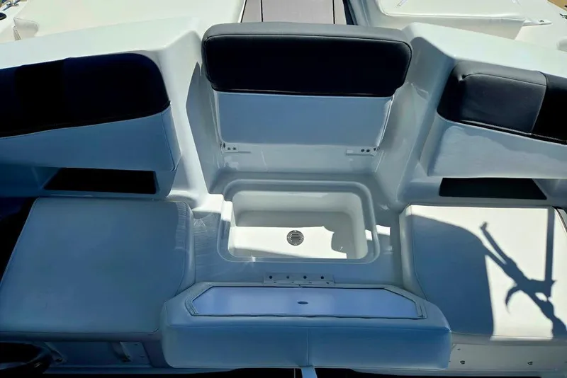 Slide: The Image of 2026 Tahoe T18 boat interior with seating and storage compartment. - 27