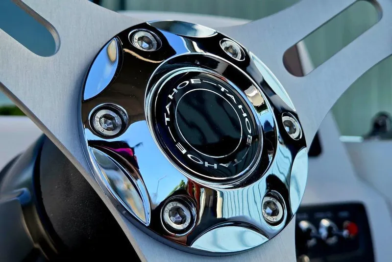 Slide: The Image of Close-up of 2026 Tahoe T18 steering wheel with chrome detailing. - 32