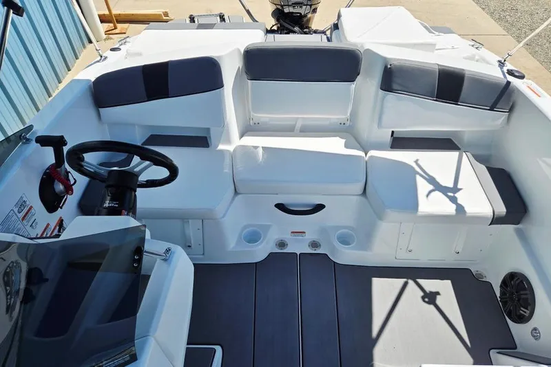 Slide: The Image of Interior of 2026 Tahoe T18 boat with seating and steering wheel. - 33