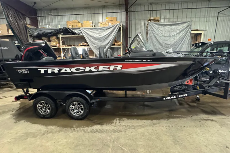 The Image of 2026 Tracker Targa V-19 Combo boat in a warehouse setting. - 0