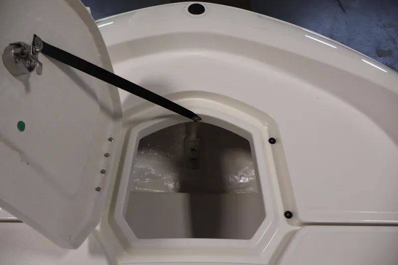 Slide: The Image of Open storage compartment on 2026 Bayliner Trophy T18 boat. - 19